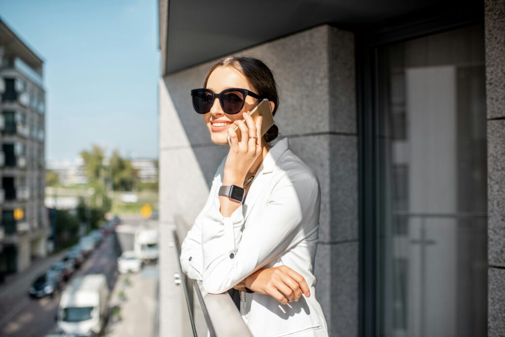 Woman on the balcony of the modern residential area